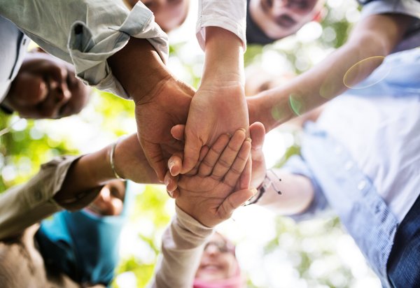 group_of_diverse_youth_hands_joined_2025_02_10_11_09_27_utc_min