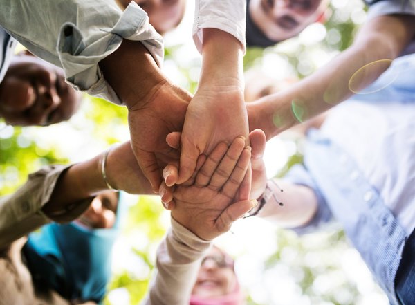 group_of_diverse_youth_hands_joined_2025_02_10_11_09_27_utc_min